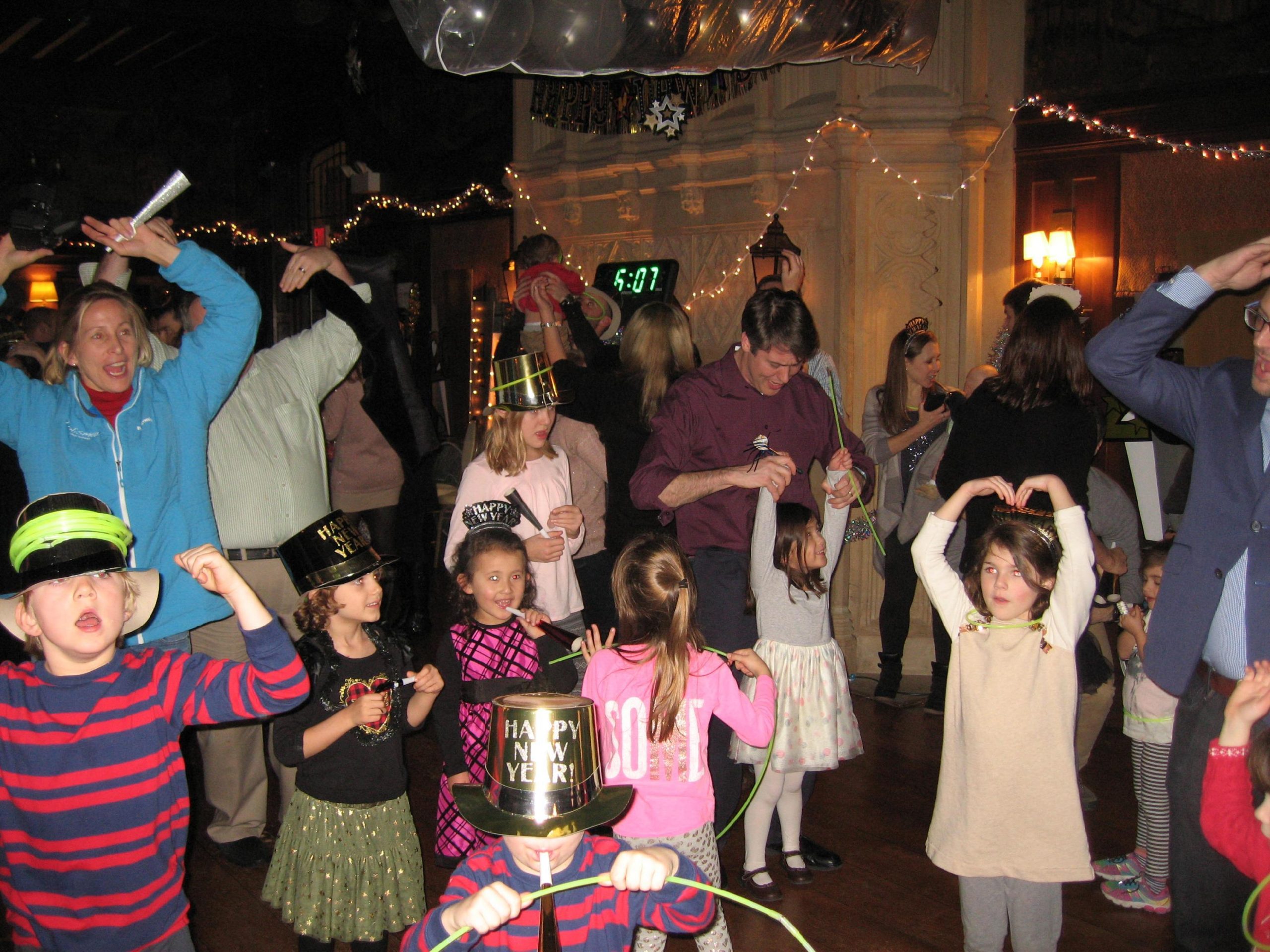 Image of families having fun at the New Canaan New Year s Eve Family Fun Night at the Waveny House